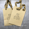 Bolsa de ropa de paquete kraft de compras con logotipo personalizado